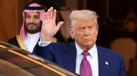 068d3600-3532-11f0-ad49-6d647ca974e9 068d3600-3532-11f0-ad49-6d647ca974e9 Getty Images Donald Trump waves with one hand as Saudi Crown Prince Mohammed bin Salman stands behind him Did Trump really strike Gulf deals worth $2tn? Did Trump really strike Gulf deals worth $2tn? 068d3600 3532 11f0 ad49 6d647ca974e9