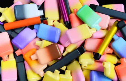 520e8480-3aff-11f0-ab2d-a33f931f78dd 520e8480-3aff-11f0-ab2d-a33f931f78dd Peter Dazeley/ Getty Creative A pile of colourful vapes. Why are disposable vapes being banned and how harmful is vaping? 520e8480 3aff 11f0 ab2d a33f931f78dd
