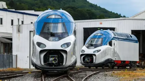 5cea9cd0-2afc-11f0-bde2-fdaffe842291 5cea9cd0-2afc-11f0-bde2-fdaffe842291 Getty Images Two power cars from Amtrak's new high-speed trains Is the US finally on track to build a high-speed rail network? 5cea9cd0 2afc 11f0 bde2 fdaffe842291