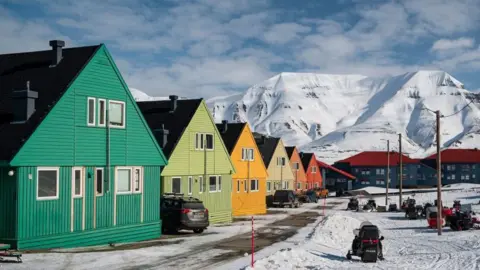 9a411350-24d7-11f0-8c66-ebf25fc2cfef 9a411350-24d7-11f0-8c66-ebf25fc2cfef Getty Images Colourful houses on a street in Longyearbyen, Norway, with snowy mountains in the distance Visit the Arctic vault holding back-ups of great works 9a411350 24d7 11f0 8c66 ebf25fc2cfef