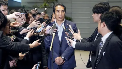 bdefd3c0-369a-11f0-bb94-dfa17a7672b5 bdefd3c0-369a-11f0-bb94-dfa17a7672b5 Reuters Japan's Agriculture, Forestry and Fisheries Minister Taku Eto speaks to the media after a meeting with Prime Minister Shigeru Ishiba over his controversial comments about receiving rice from supporters, Tokyo, Japan 19 May, 2025. How a joke about rice cost a Japan cabinet minister his job bdefd3c0 369a 11f0 bb94 dfa17a7672b5