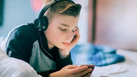 c425e370-2672-11f0-804c-dd0e5522cf26 c425e370-2672-11f0-804c-dd0e5522cf26 Getty Images Boy with headphones on teen mental health: when to seek help and what parents can do Teen mental health: When to seek help and what parents can do c425e370 2672 11f0 804c dd0e5522cf26