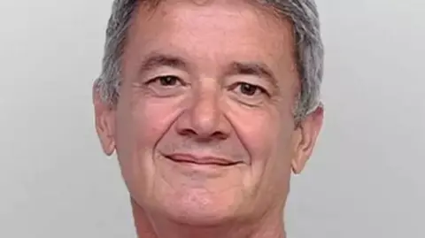 ca108dd0-44fa-11ef-b9f5-adf0805847e7 ca108dd0-44fa-11ef-b9f5-adf0805847e7 BBC A man smiling while looking ahead at the camera Doctor accused of falsifying artificial mesh records ca108dd0 44fa 11ef b9f5 adf0805847e7