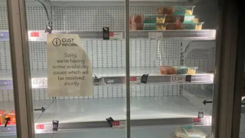 cd1042f0-304f-11f0-93a2-fdf913398051 cd1042f0-304f-11f0-93a2-fdf913398051 A shop fridge with almost empty shelves, and a sign stuck on the window which says "Sorry we are having some availability issues which will be resolved shortly" A letter from the M&S hackers landed in my inbox - this is what happened next A letter from the M&S hackers landed in my inbox – this is what happened next cd1042f0 304f 11f0 93a2 fdf913398051