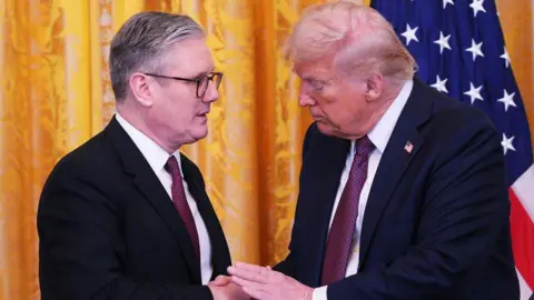 f0b22730-2bce-11f0-94de-1ded48148d91 f0b22730-2bce-11f0-94de-1ded48148d91 Getty Images US President Donald Trump and British Prime Minister Keir Starmer shake hands during a joint press conference in the East Room of the White House in Washington, DC, on 27 February, 2025. US and UK expected to announce deal to reduce tariffs f0b22730 2bce 11f0 94de 1ded48148d91