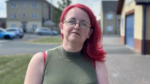 ff3f5120-3618-11f0-8f93-0590071db98a ff3f5120-3618-11f0-8f93-0590071db98a Tracy McGuigan-Haigh smiles outside a housing area Bills push inflation to highest in more than a year Bills push inflation to highest in more than a year ff3f5120 3618 11f0 8f93 0590071db98a
