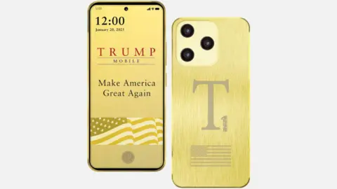 1e9739e0-4b66-11f0-9a0b-27ba8ae87ef8 1e9739e0-4b66-11f0-9a0b-27ba8ae87ef8 Trump Mobile The front and back of the gold coloured Trump phone Experts question whether $499 gold Trump phone can be US-made 1e9739e0 4b66 11f0 9a0b 27ba8ae87ef8