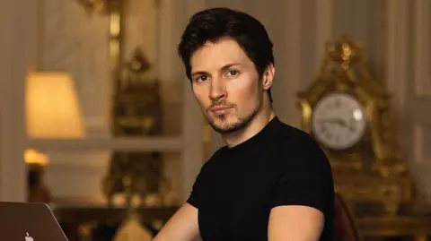 2bcf07b0-4d86-11f0-962b-5d5c698f3d78 2bcf07b0-4d86-11f0-962b-5d5c698f3d78 Pavel Durov/Instagram Tech billionaire Pavel Durov looks to the camera as he types on an Apple laptop. He is wearing a black t-shirt. There is an ornate clock in the background. Telegram boss says he has fathered more than 100 children 2bcf07b0 4d86 11f0 962b 5d5c698f3d78