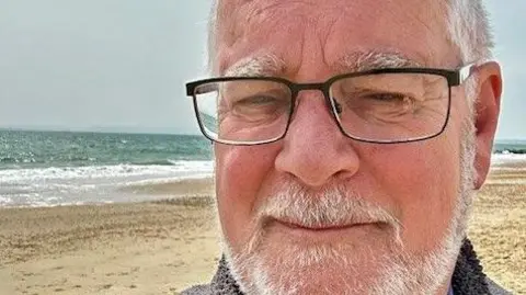 449bd520-4557-11f0-82d5-89ce01115edf 449bd520-4557-11f0-82d5-89ce01115edf Ian Bryant Ian is pictured in a selfie on the beach with a neutral expression 'It will make a lot of difference': Reactions to winter fuel payment U-turn 449bd520 4557 11f0 82d5 89ce01115edf
