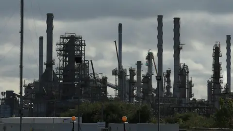 47086760-55b5-11f0-adae-51d36c615fe4 47086760-55b5-11f0-adae-51d36c615fe4 Getty Images The Prax Lindsey Oil Refinery. A cluster of metal structures rising to the grey sky. Calls for inquiry as 420 refinery jobs at risk 47086760 55b5 11f0 adae 51d36c615fe4