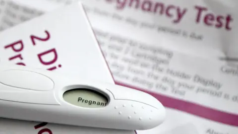 6878bb30-45e7-11f0-a075-df12ca9c8444 6878bb30-45e7-11f0-a075-df12ca9c8444 PA A positive pregnancy test lies on top of the test box which is white with magenta writing, the instructions for the kit are blurred out in the background. Wales is UK worst for surgical abortions, says charity 6878bb30 45e7 11f0 a075 df12ca9c8444