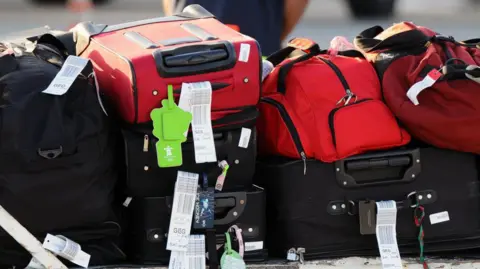 7c390cc0-3fa6-11f0-9662-93b759fb8bcd 7c390cc0-3fa6-11f0-9662-93b759fb8bcd Getty Images Luggage at an airport How airline fees have turned baggage into billions 7c390cc0 3fa6 11f0 9662 93b759fb8bcd