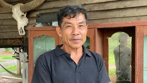 bd59f030-4cf2-11f0-9604-9d8ffb525450 bd59f030-4cf2-11f0-9604-9d8ffb525450 Thai farmer Seng Wongsena Why your old mobile phone may be polluting Thailand bd59f030 4cf2 11f0 9604 9d8ffb525450