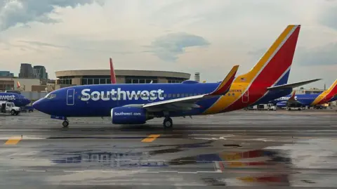 cf153540-3fa6-11f0-afc8-f15b3ef1cfc4 cf153540-3fa6-11f0-afc8-f15b3ef1cfc4 Getty Images A SouthWest aircraft How airline fees have turned baggage into billions cf153540 3fa6 11f0 afc8 f15b3ef1cfc4