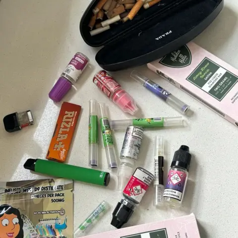 e4b0fb60-5431-11f0-8485-7bd50fa63665 e4b0fb60-5431-11f0-8485-7bd50fa63665 Various nicotine paraphernalia, including cigarettes, Rizla and various vapes Emma is doing something she swore she never would – buying her kids vapes e4b0fb60 5431 11f0 8485 7bd50fa63665