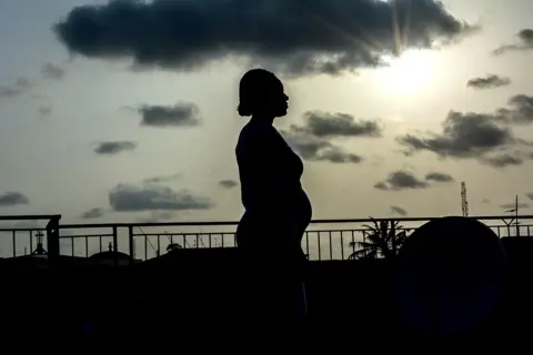 3b2884e0-5829-11f0-b5c5-012c5796682d 3b2884e0-5829-11f0-b5c5-012c5796682d Getty Images Pregnant woman, Lagos, Nigeria Woman smuggled baby into UK using fake birth story 3b2884e0 5829 11f0 b5c5 012c5796682d
