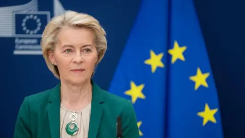 500c50a0-6006-11f0-bba6-055e08803492 500c50a0-6006-11f0-bba6-055e08803492 Getty Images European Commission President Ursula von der Leyen sitting in front of the EU flag EU delays retaliatory trade tariffs against US 500c50a0 6006 11f0 bba6 055e08803492