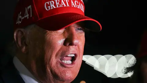 6a2f8bd0-58d3-11f0-a113-db0360eed65c 6a2f8bd0-58d3-11f0-a113-db0360eed65c Getty Images US President Donald Trump wearing red cap with 45-47 seen on the side and GREAT AGAIN seen on the front Trump says US to start sending out tariff letters 6a2f8bd0 58d3 11f0 a113 db0360eed65c