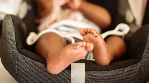 6e97e130-5e74-11f0-a633-790fe0633fd6 6e97e130-5e74-11f0-a633-790fe0633fd6 Getty Images Newborn baby in travel seat Woman smuggled baby into UK using fake birth story 6e97e130 5e74 11f0 a633 790fe0633fd6