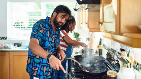 96c04150-5287-11f0-ad6a-617a010885d7 96c04150-5287-11f0-ad6a-617a010885d7 Getty Images Couple cook on a hob in a kitchen. Household energy bills fall but may not go much lower 96c04150 5287 11f0 ad6a 617a010885d7