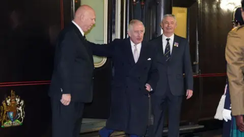 Getty Images King Charles is seen exiting the royal train in 2023  Royal train to be cut in Palace cost-saving measure cb2f20d0 55f4 11f0 aeb1 8f3881a15439