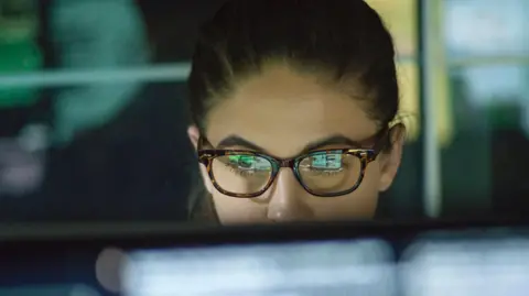 ecfe2ba0-57db-11f0-bac7-59e5f1e1335c ecfe2ba0-57db-11f0-bac7-59e5f1e1335c Getty Images Close of of young woman wearing glasses looking at monitor UK borrowing costs fall as investors' nerves ease ecfe2ba0 57db 11f0 bac7 59e5f1e1335c