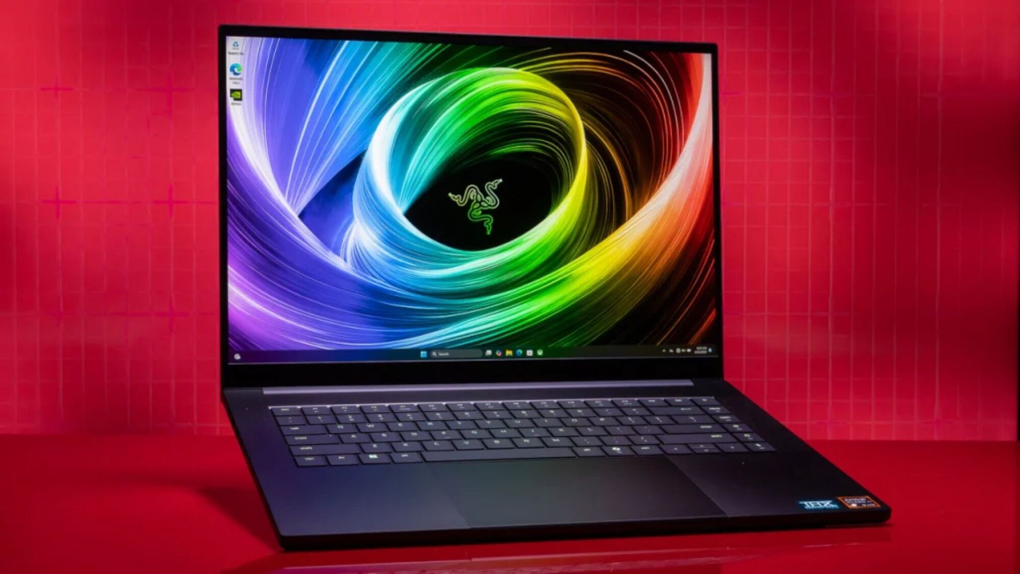 images-1 images-1 razer blade 16 laptop with colorful abstract screensaver against a red backdrop The 3 best gaming laptops with Nvidia GPUs in 2025, so far images 1